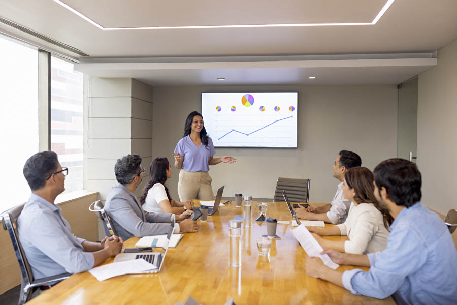 Supportio team collaborating in a modern boardroom